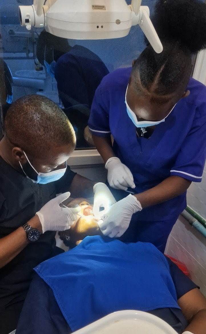 Dentist and assistant treating a patient at Lebanon Dental Care, Mombasa
